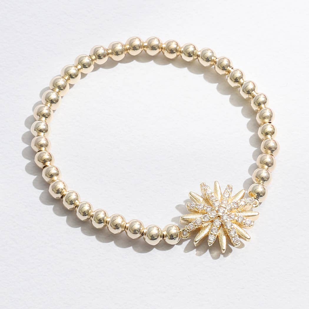 Gold Tone Starburst Charm Beaded Bracelet