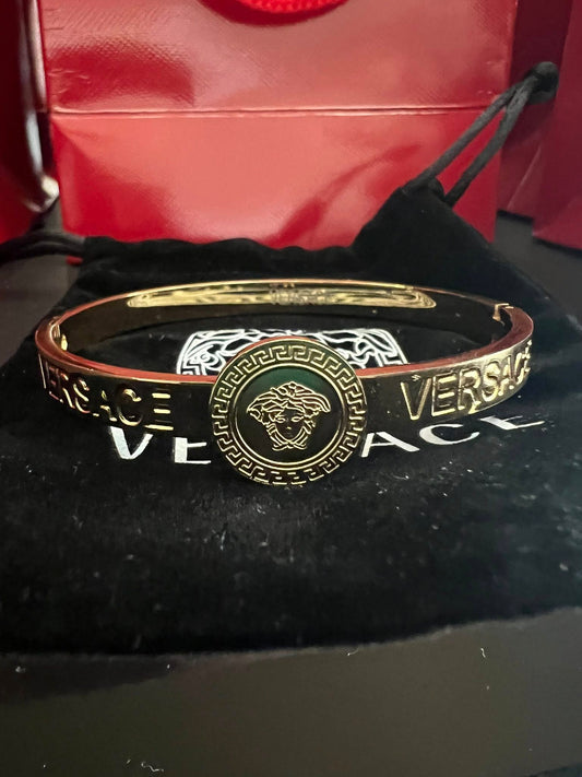 Elegant Gold Cuff Bracelet with Medallion