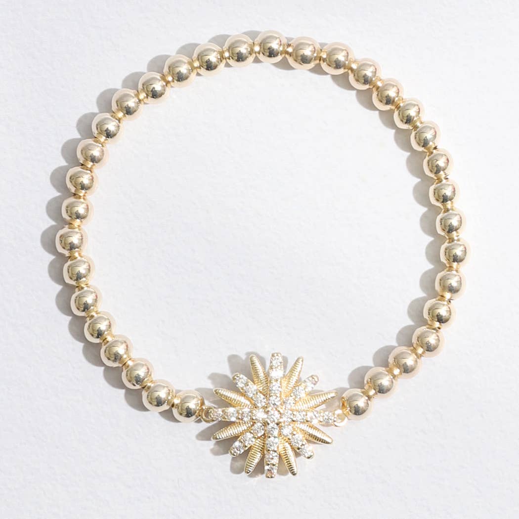 Gold Tone Starburst Charm Beaded Bracelet