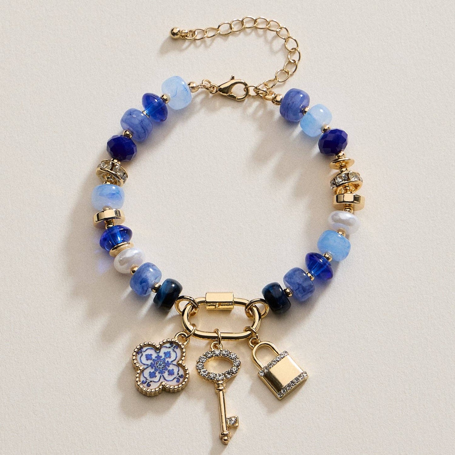 Vibrant Beaded Bracelet | Gold-Tone Trio Charms