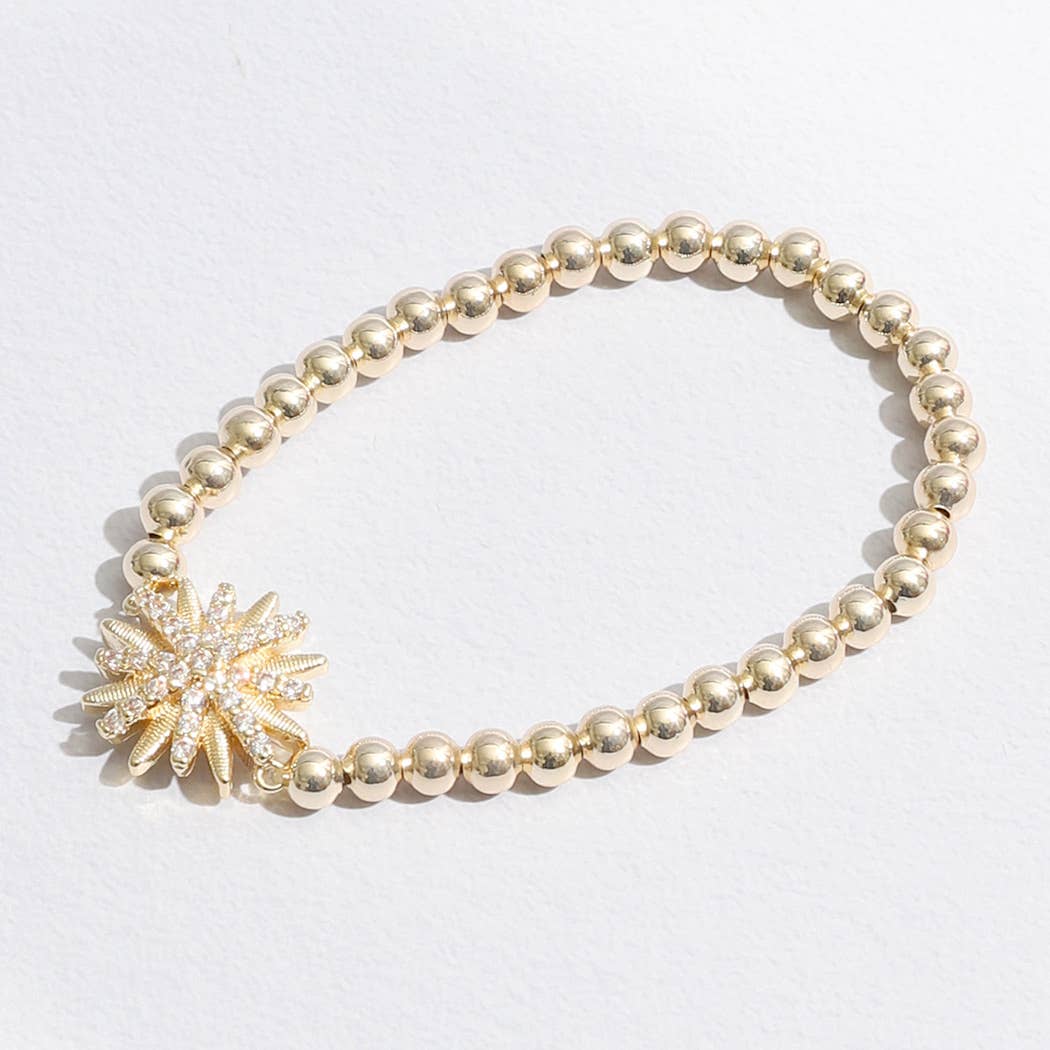 Gold Tone Starburst Charm Beaded Bracelet